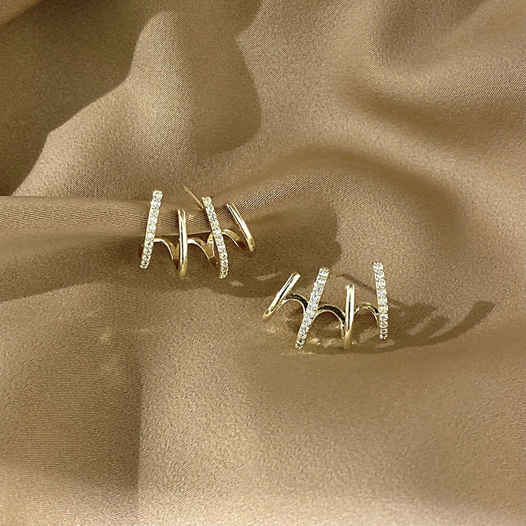 ARETES DE 4 GARRAS