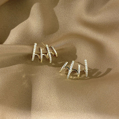 ARETES DE 4 GARRAS